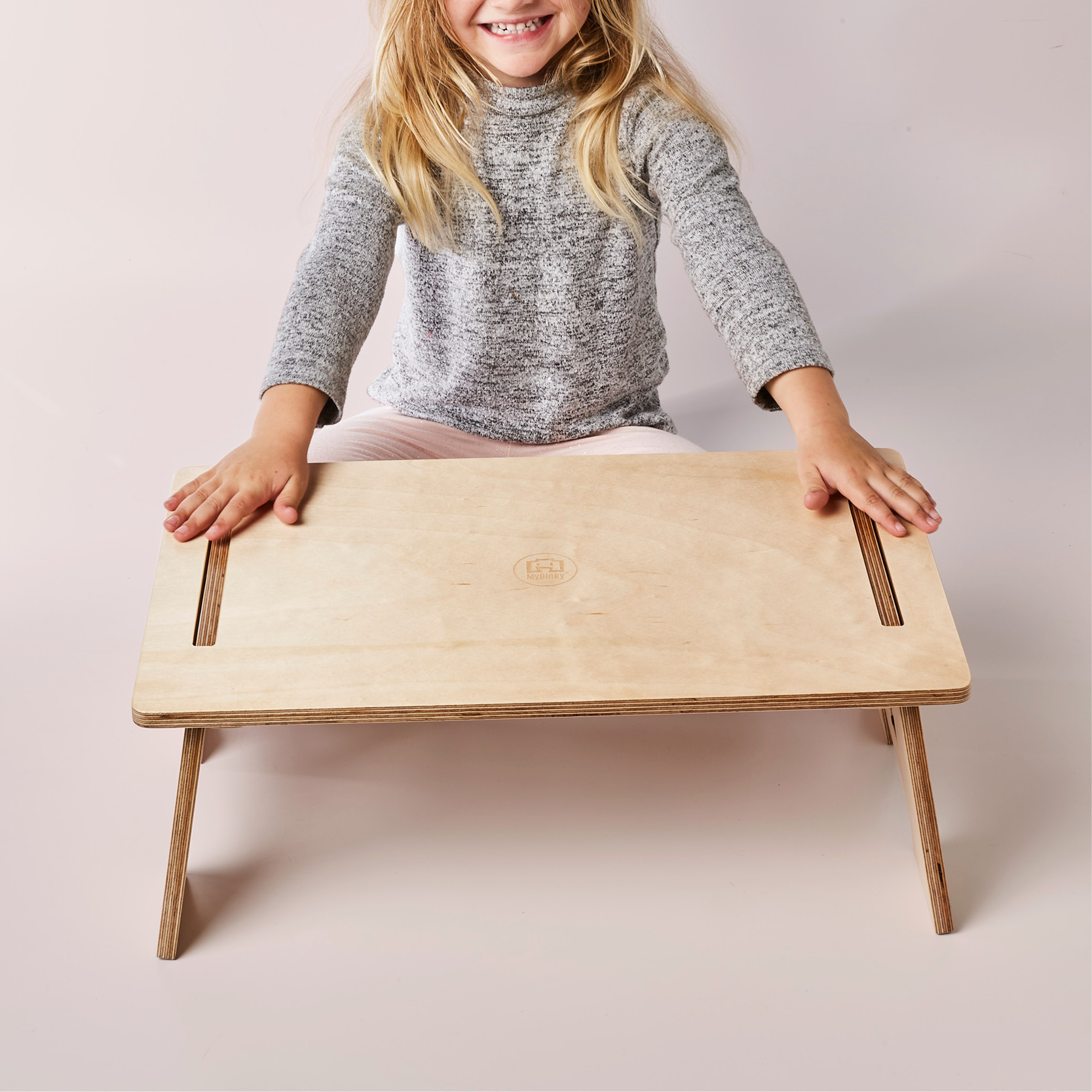 child sitting with the mydinky step