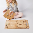 Child putting the leg into a MyDinky step