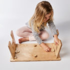 Child putting together MyDinky legs